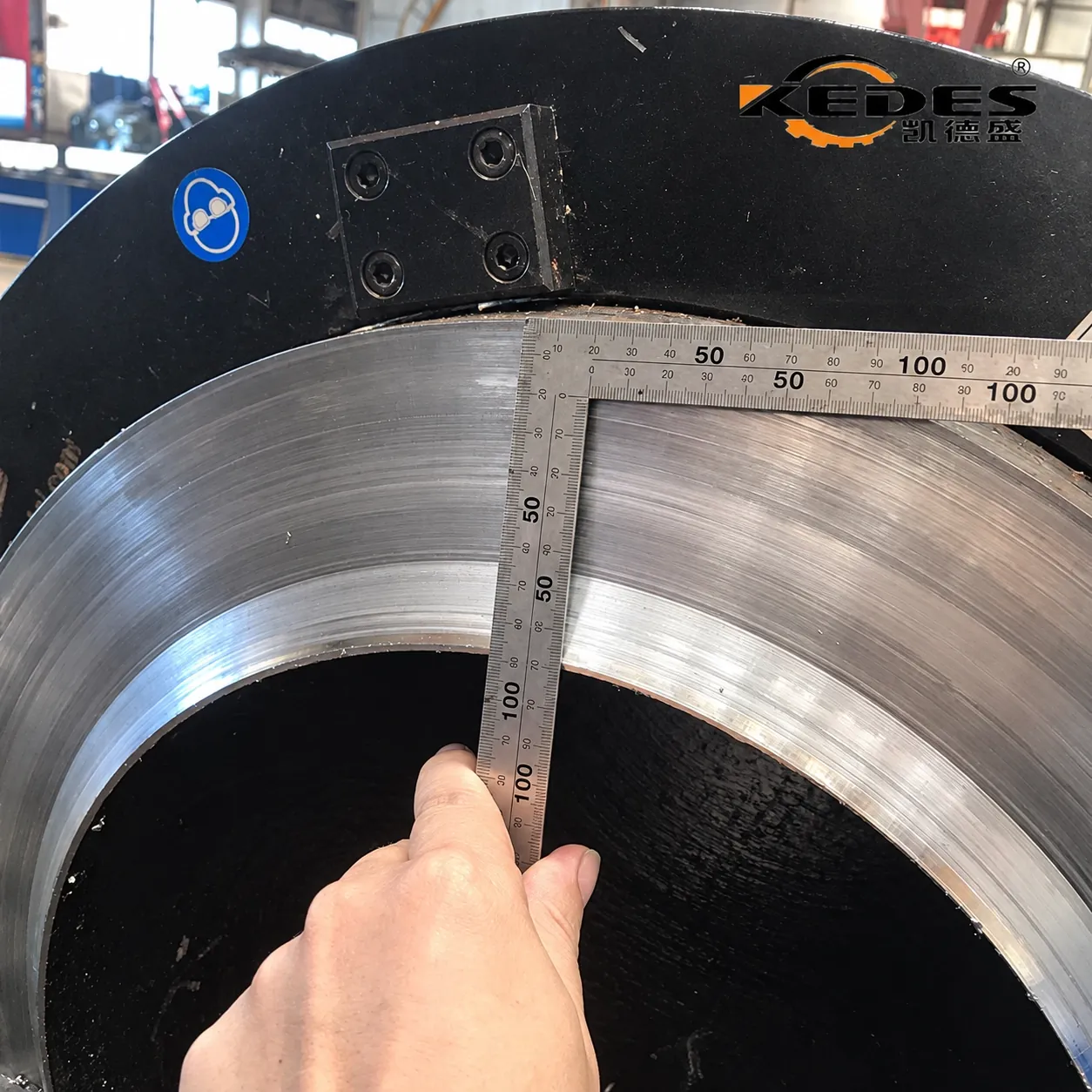 Machined pipe end face checked with a steel square