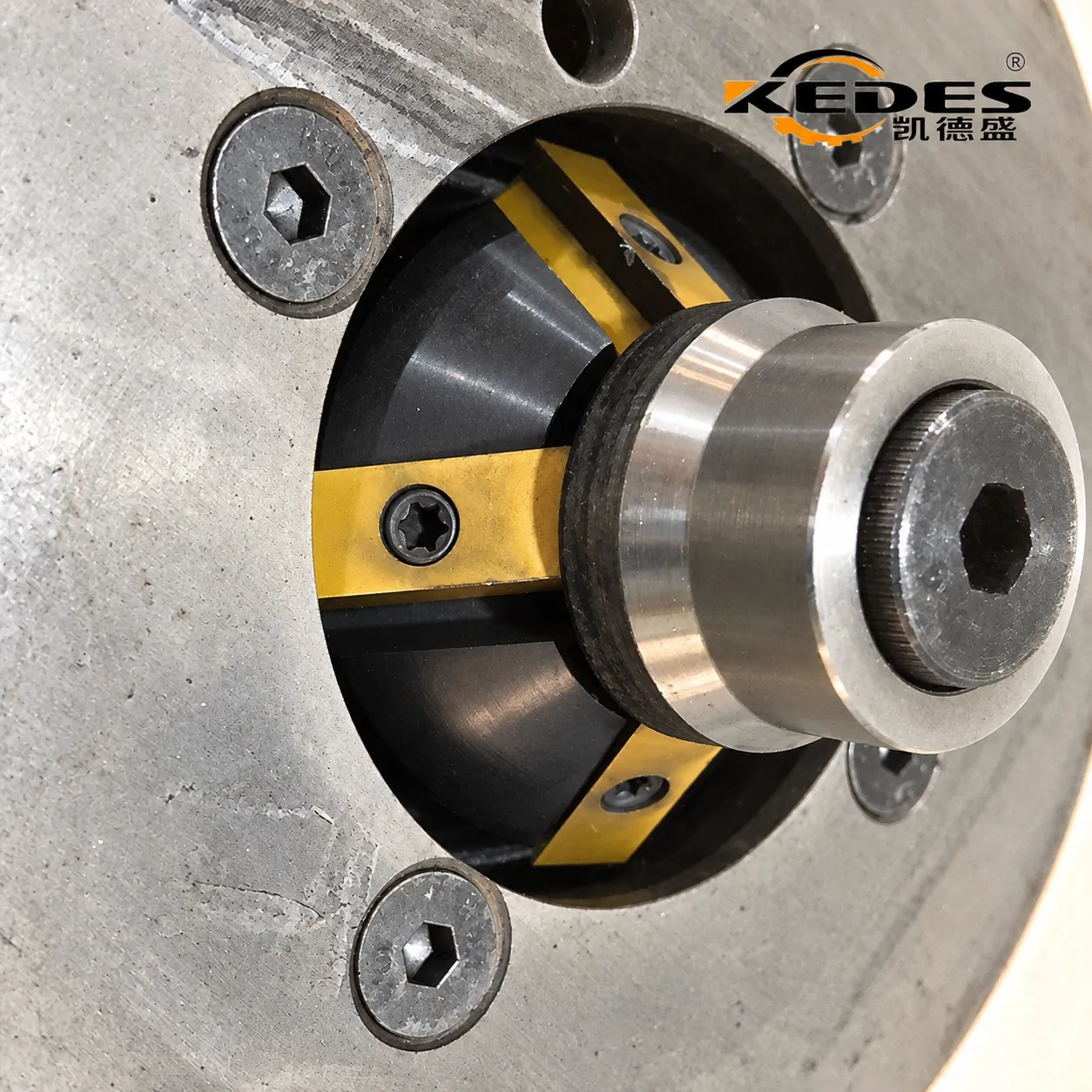 Close-up of the HDL cutter head with carbide inserts and guide bearing